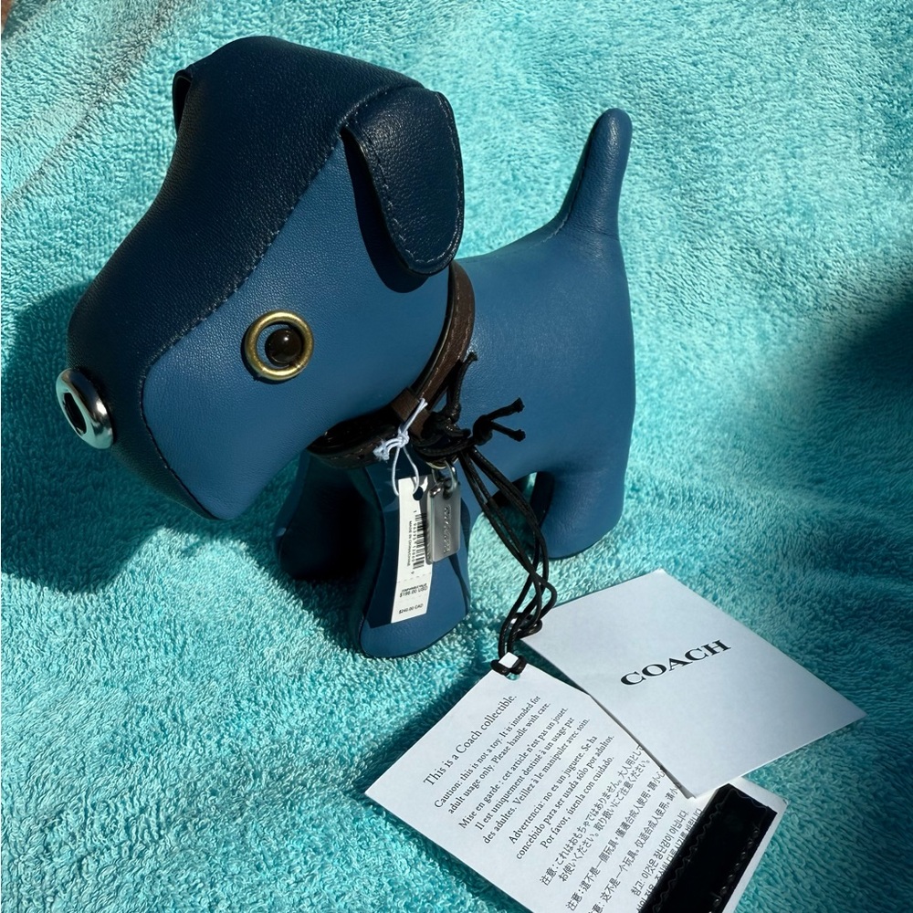 Authentic limited edition COACH collectible dog paperweight.